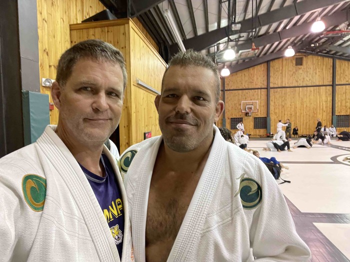 Wes Schaeffer with Dean Lister at the Origin BJJ camp