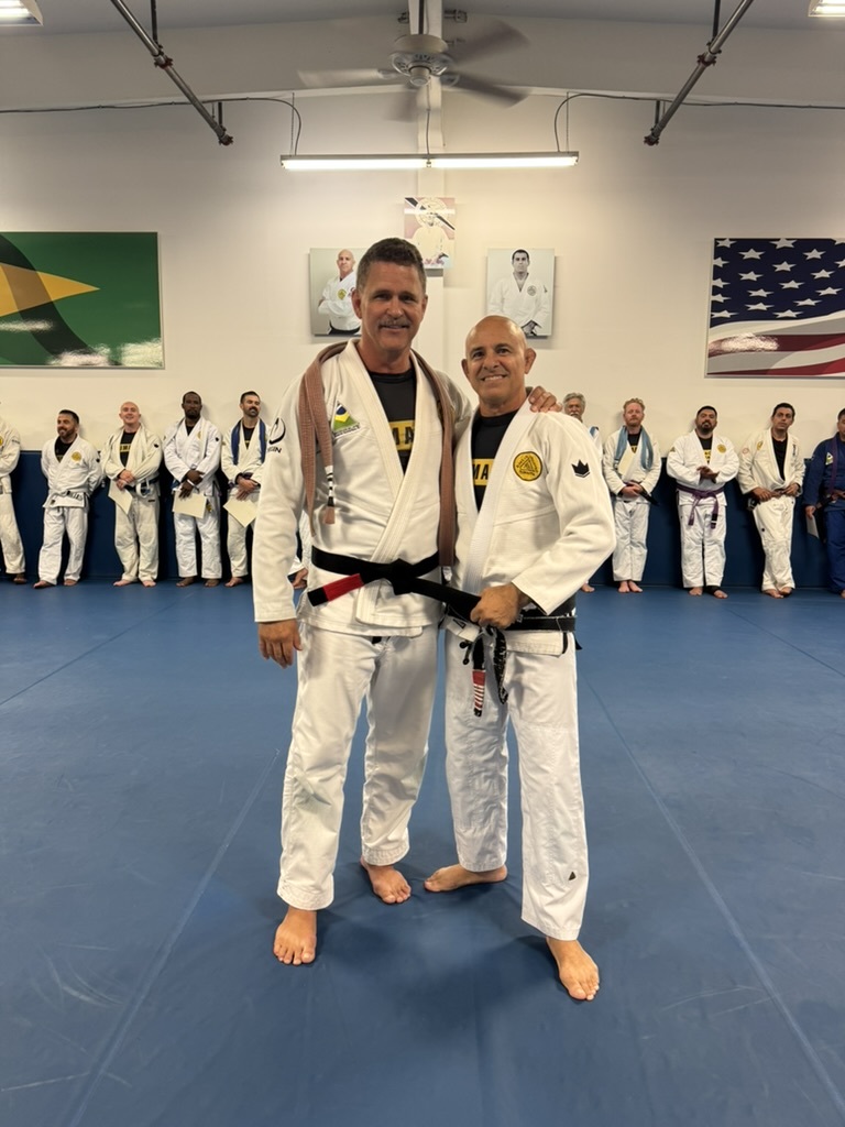 Wes Schaeffer receiving his Brazilian Jiu-Jitsu black belt from Ricardo